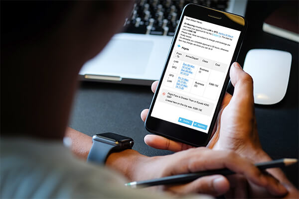 Mobile phone mock up office_Atriis Approval - Midas Travel Management