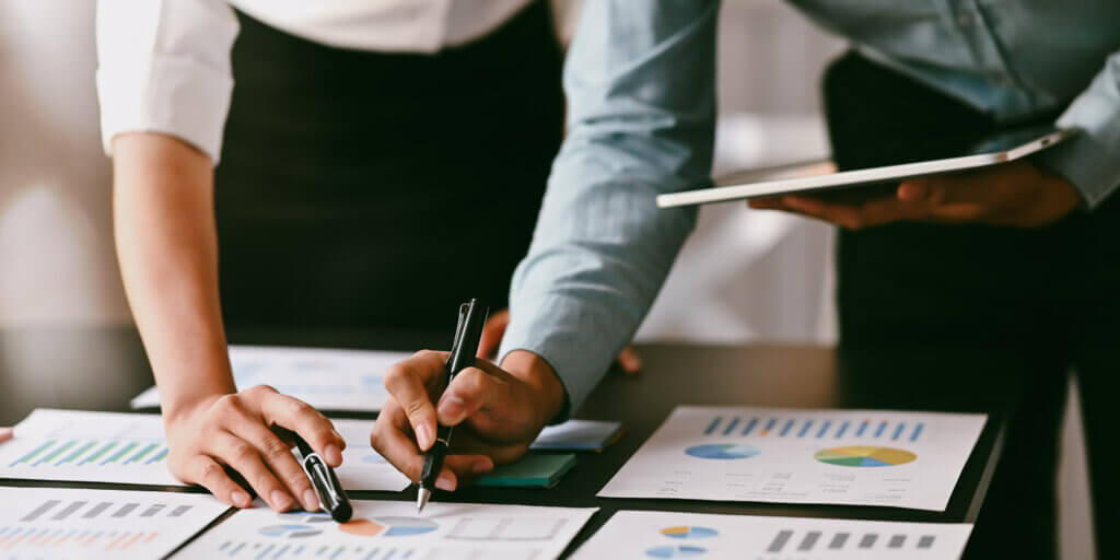 finance officer using data to budget and forecast travel spend