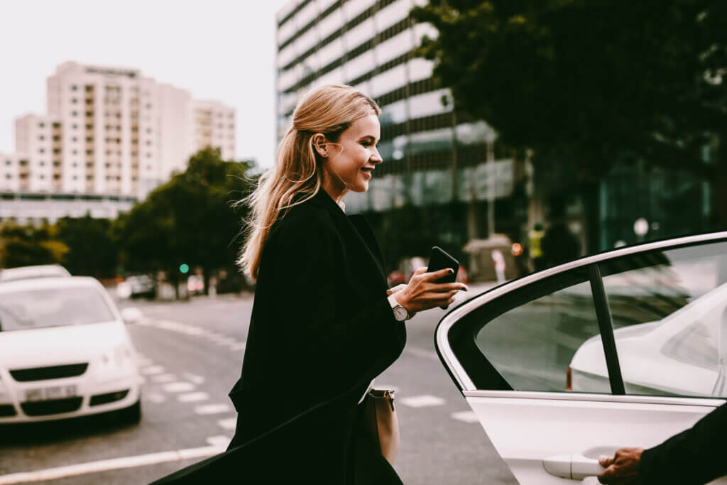 travel booker organises a chauffeur transfer for their traveller